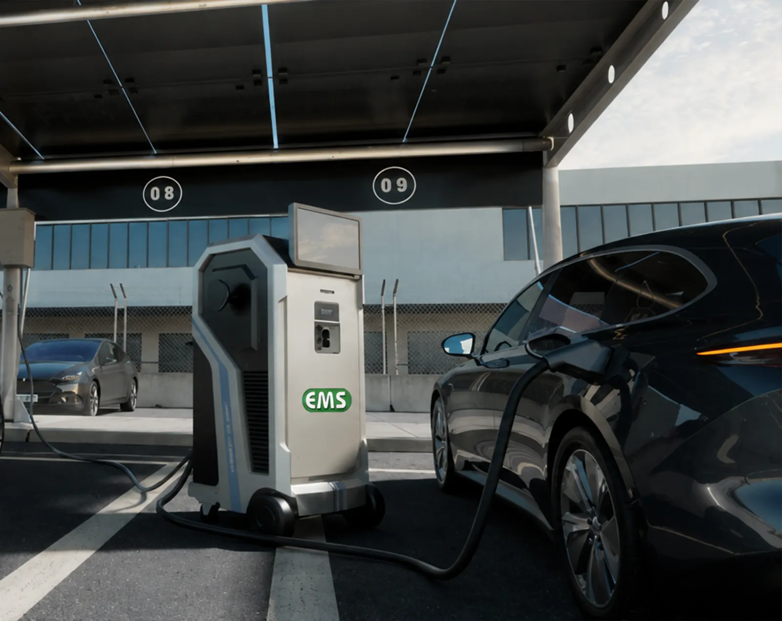 EMS mobile charger plugged into an electric car under a solar canopy