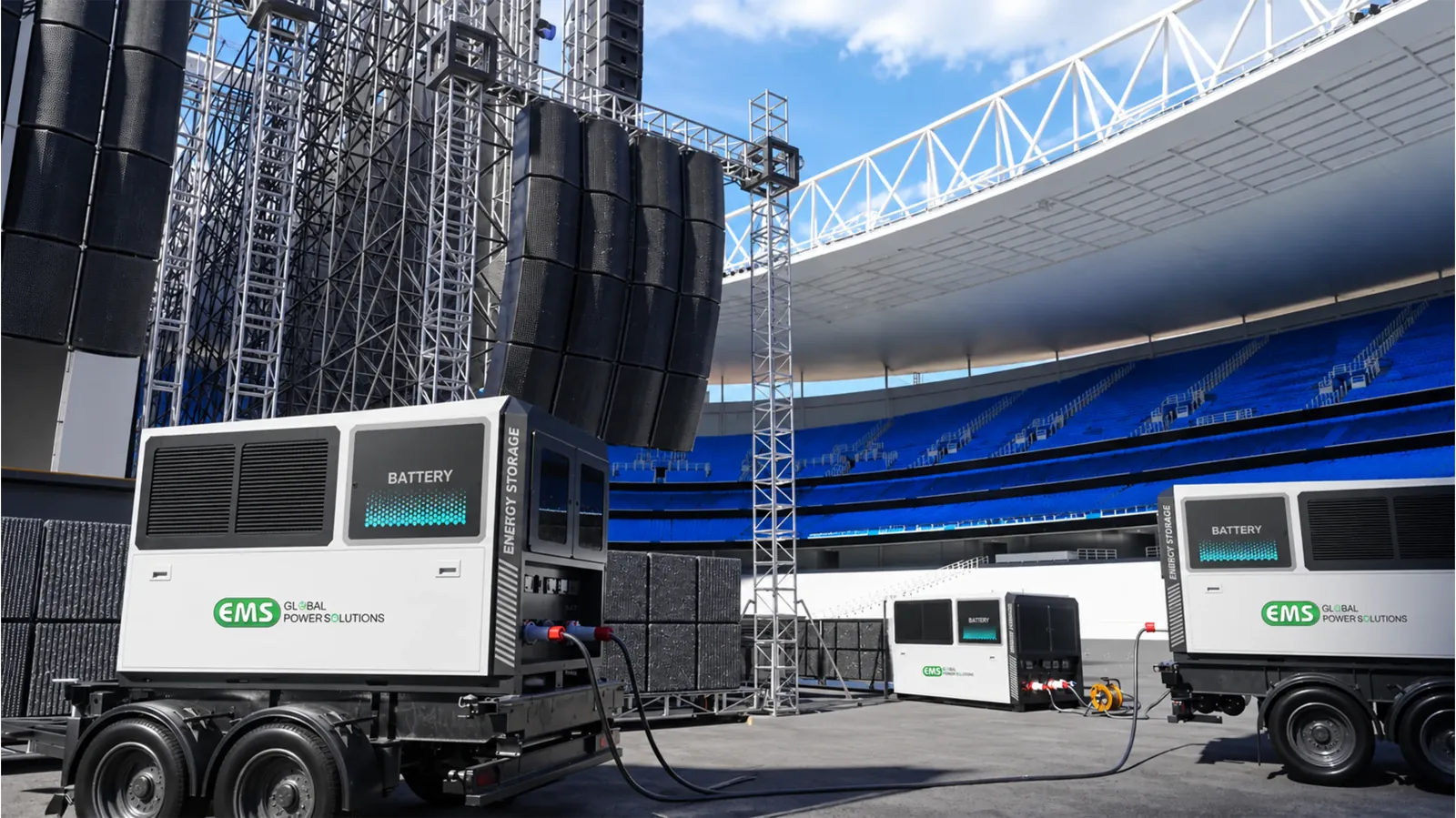 Mobile battery units powering the stage at a stadium event